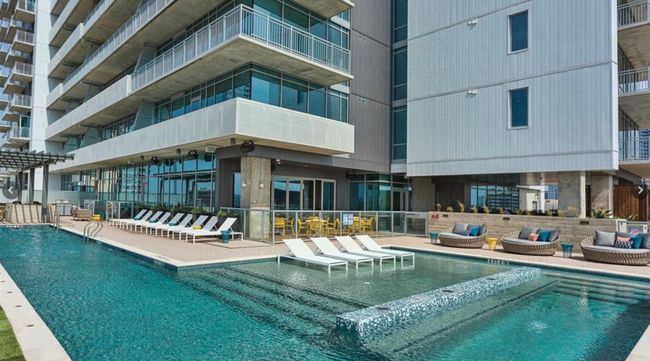 Community pool featuring outdoor lounge area and a patio | Image 23
