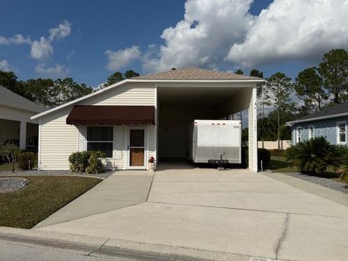 1155 Motorcoach Dr, POLK CITY, FL, 33868-9115 | Card Image