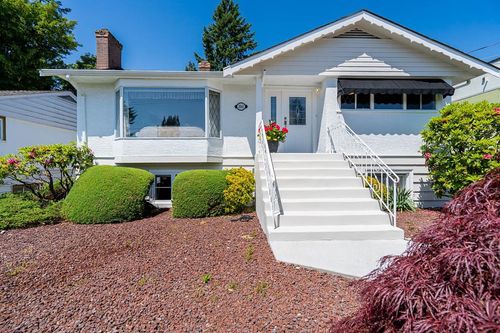 1061 Seventh Avenue, House other with 4 bedrooms, 2 bathrooms and 2 parking in New Westminster BC | Card Image