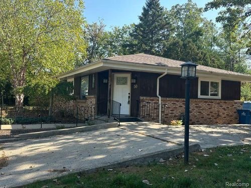 50 Main St, Coopersville, MI, 49404-1231 | Card Image