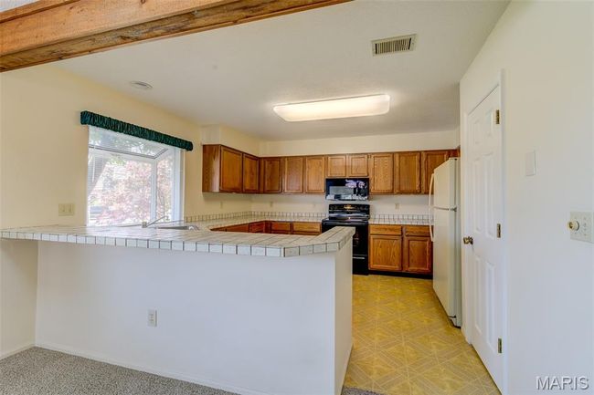 F - 228 Hemingway Ln, Condo with 2 bedrooms, 2 bathrooms and 2 parking in Weldon Spring MO | Image 15