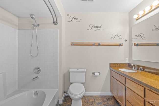 Full bath featuring vanity and shower combination | Image 19