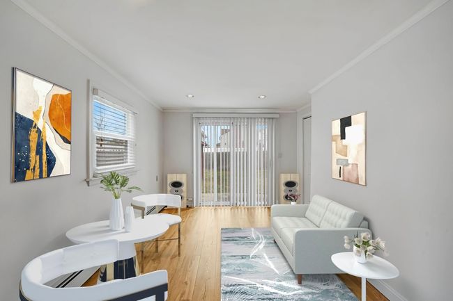 Living room with crown molding and wood-type flooring | Image 33