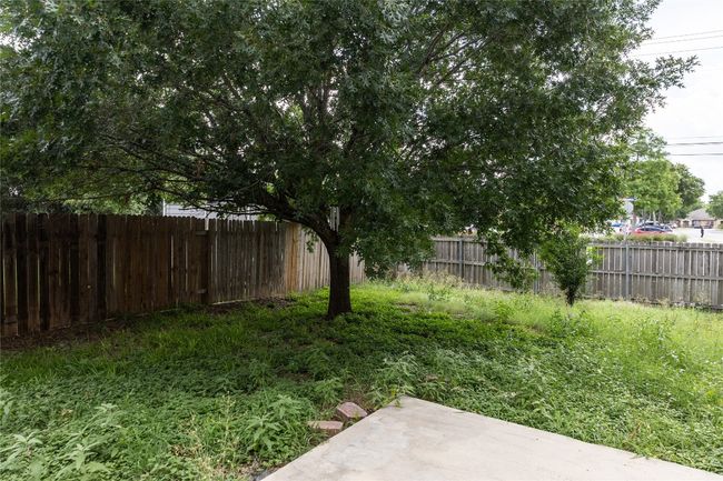 Fenced backyard featuring a patio area | Image 21