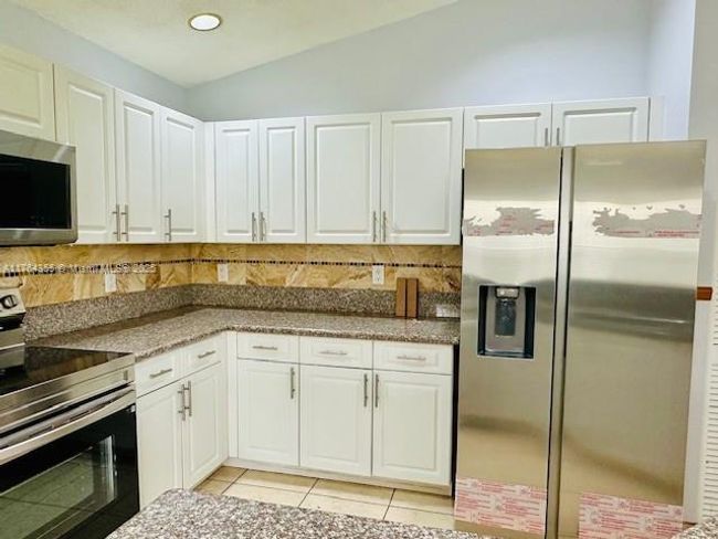 495 Carrington Ln, House other with 4 bedrooms, 3 bathrooms and null parking in Weston FL | Image 15