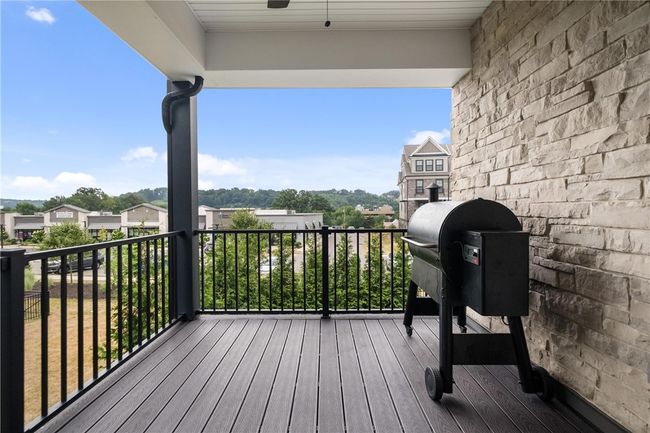 Rear covered deck off of the Main Floor Dining area. | Image 16