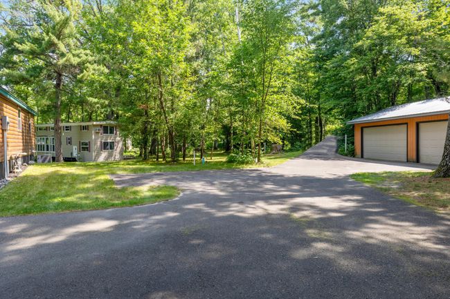 Ample storage AND previous owners would push their snowmobiles in here after a long ride, keeping them warm and ready for the next run! | Image 18