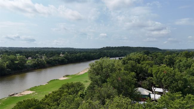 Drone / aerial view of a large body of water and a local golf course | Image 21