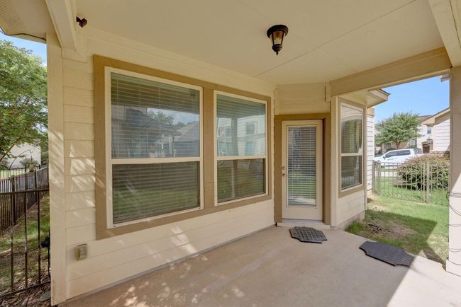 The patio is well shaded in the afternoons and comes with ample room for setting up an outdoor living/dining area. | Image 27