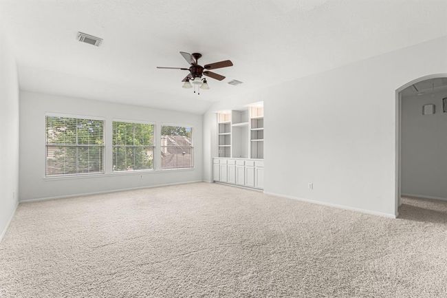 The large gameroom has room for a pool table. The built-in provides a place for games and your entertainment system. | Image 30