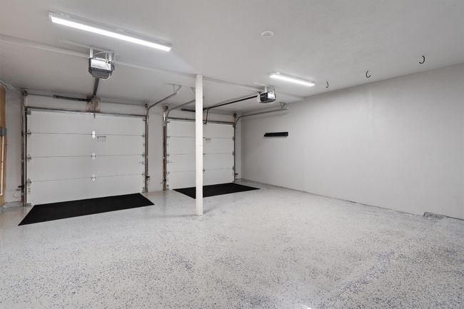 Garage featuring a garage door opener | Image 37