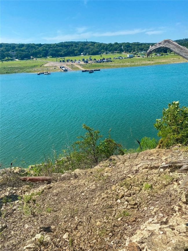 Enjoy easy water access with a charming limestone staircase leading to the lake. Note: Current water levels are below capacity. | Image 19