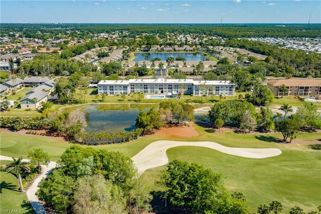 Birds eye view of property featuring a residential view, a water view, and golf course view | Image 45