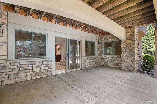 Walkout access to covered patio | Image 44