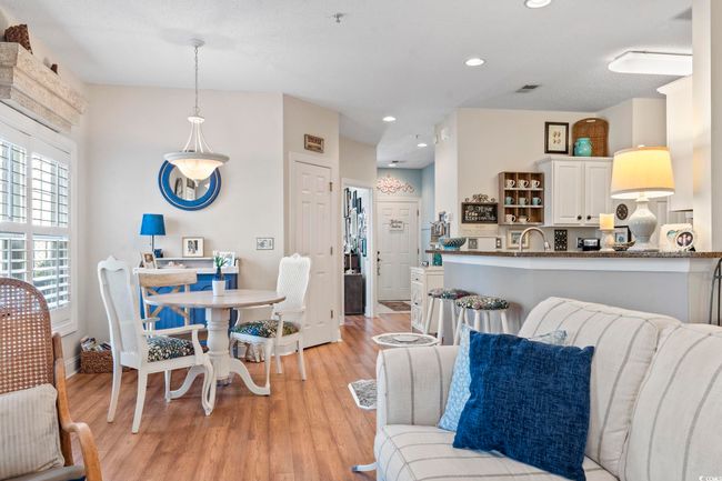 Dining room featuring baseboards, recessed lighting, and light wood-style floors | Image 19