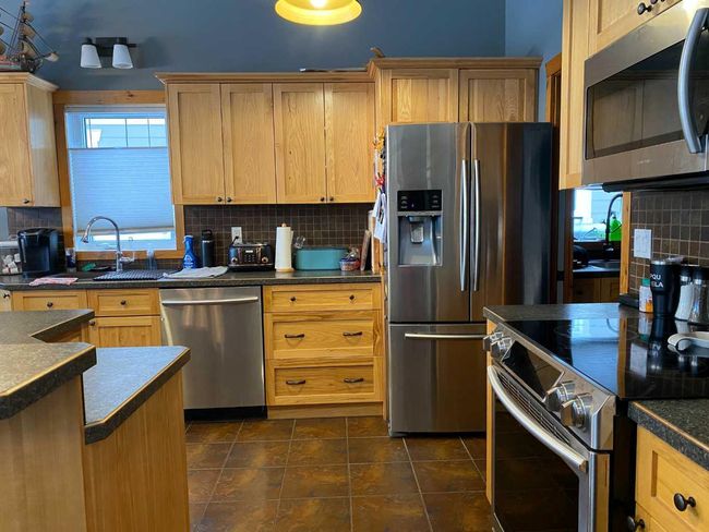 #68 Ironstone Drive, Townhouse with 4 bedrooms, 3 bathrooms and 4 parking in Coleman AB | Image 8