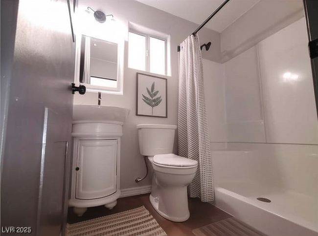 Full bathroom featuring a stall shower and vanity | Image 17