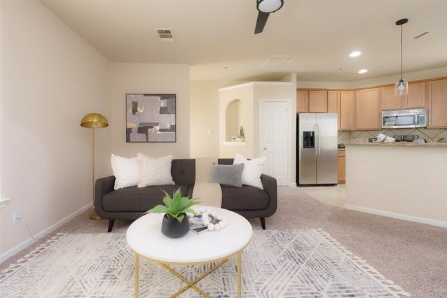 Living area with recessed lighting, baseboards, visible vents, and light colored carpet | Image 4