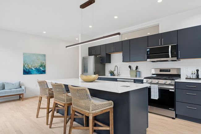 High-end stainless steel appliances elevate the kitchen experience, blending style with everyday function. | Image 7