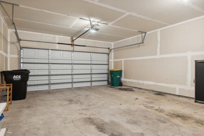 The 26d x 20w garage is sheet rocked and has extra depth for a workbench or storage for other things. | Image 42