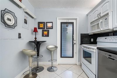 301 - 2600 S Course Dr, Condo with 3 bedrooms, 2 bathrooms and null parking in Pompano Beach FL | Image 3