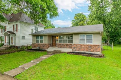 View of front of property featuring a front yard | Image 1