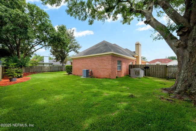 1766 Buttonbush Way, House other with 4 bedrooms, 2 bathrooms and null parking in Fleming Island FL | Image 44