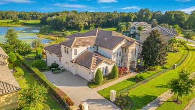 Another aerial view of this beautiful Mediterranean estate. | Image 3