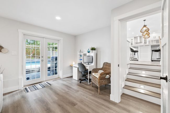 Office space with recessed lighting, french doors, baseboards, and wood finished floors | Image 10