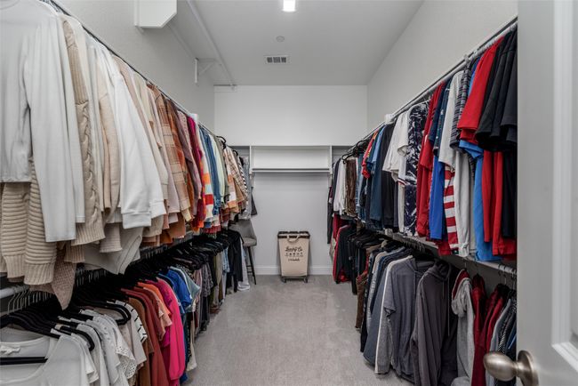 Walk in closet with carpet flooring | Image 19
