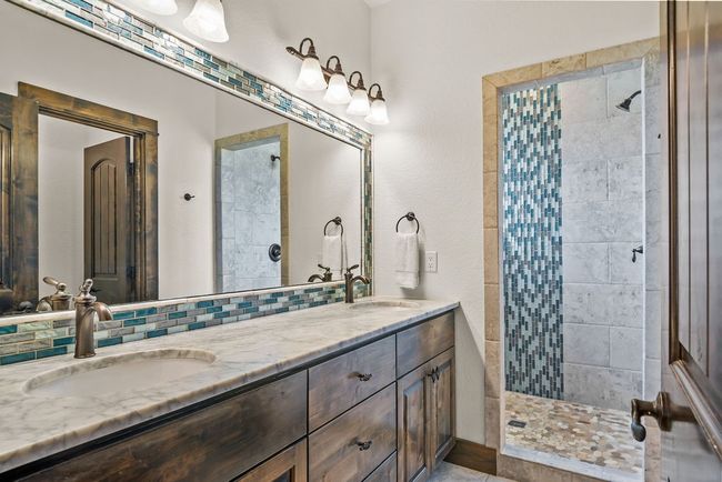 Double vanity bathroom, tiled shower | Image 13
