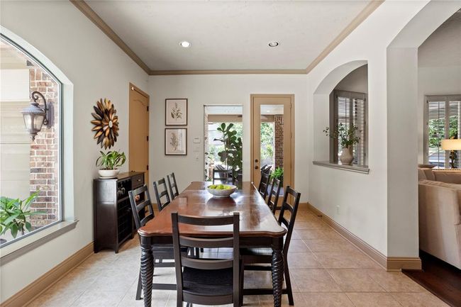 Breakfast area is large enough for an 8 person table plus a hutch. | Image 13