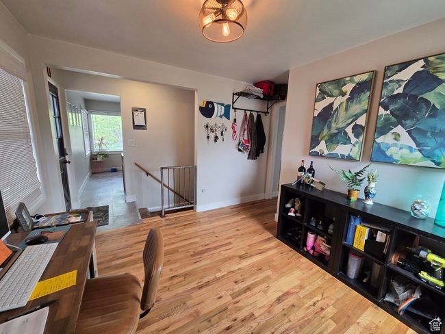 Interior space featuring wood finished floors and baseboards | Image 22