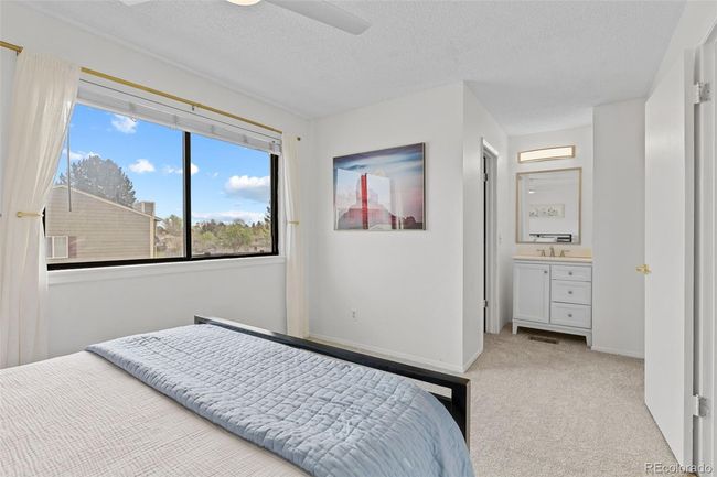 Primary bedroom with walk-in closet and ensuite bath | Image 18