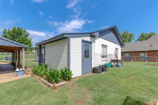 View of home's exterior featuring a yard | Image 40