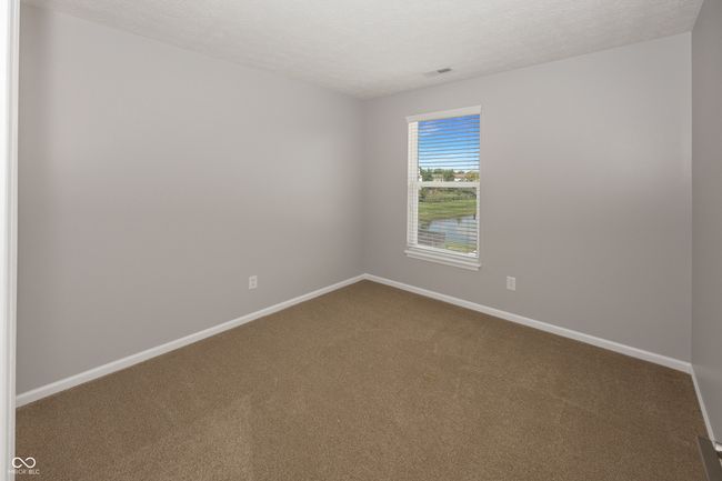 Bedroom with pond view | Image 37