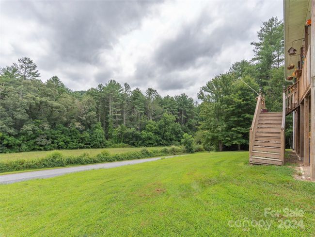 Sloping lot with plenty of room to roam in a rural country setting | Image 26