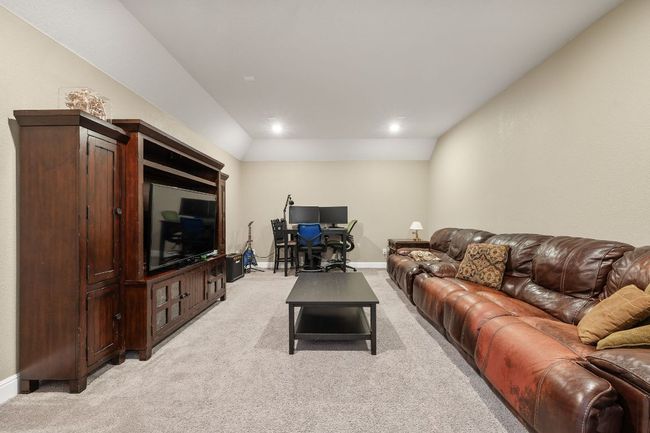 Living room featuring light carpet and recessed lighting | Image 28