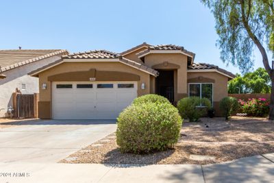 Great curb appeal with mature trees | Image 1