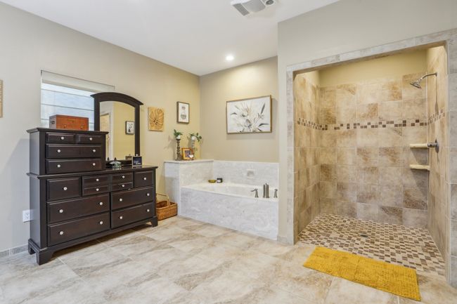 Bathroom featuring independent shower and bath and vanity | Image 28