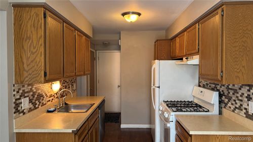 15846 Cambridge Dr, Clinton Twp, MI, 48038-1010 | Card Image