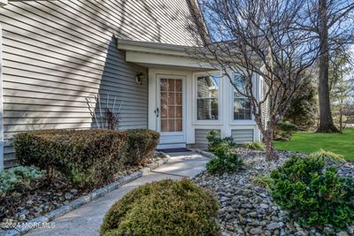 Landscaded entryway. | Image 3