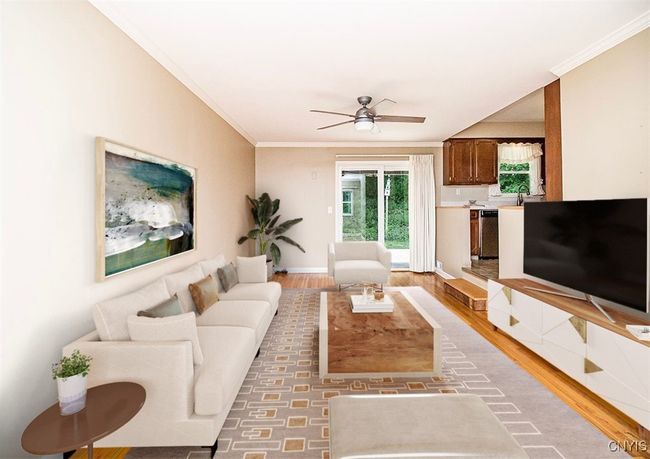 A virtually staged room provides a look into a furnished space... | Image 25