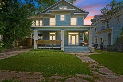 View of front of property featuring covered porch and a lawn | Image 3