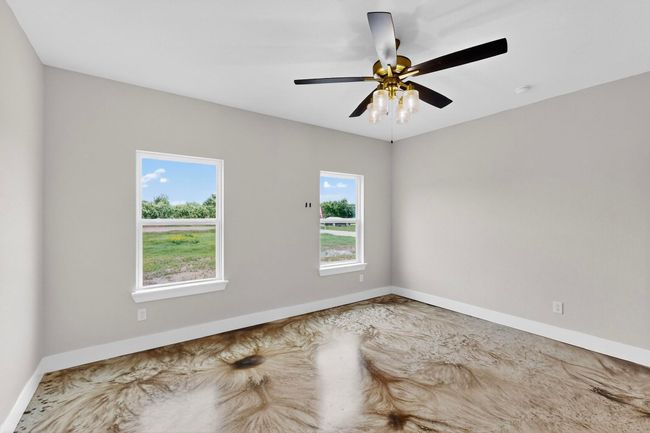 Empty room with baseboards and ceiling fan | Image 27