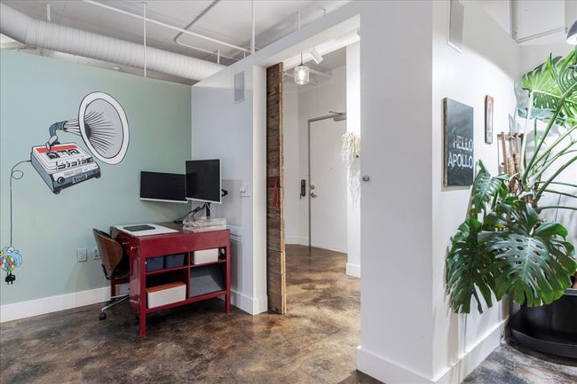 Office featuring concrete flooring and baseboards | Image 19