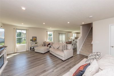 Living room featuring light hardwood floors | Image 2