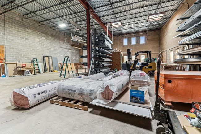 Able to move a fork lift around inside without and | Image 13