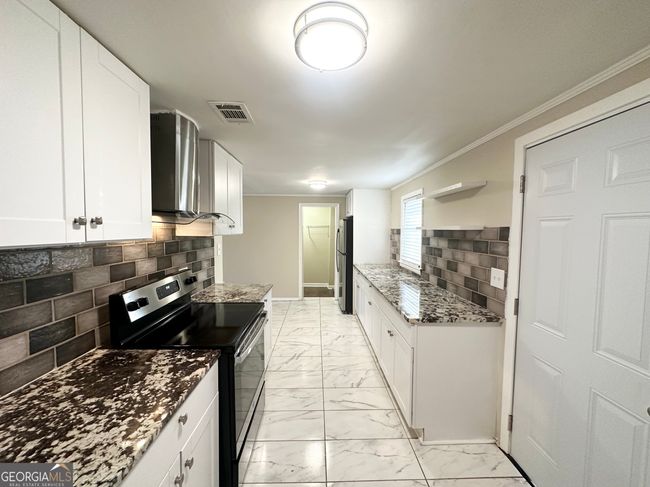 6069 Wisteria Ln, House other with 4 bedrooms, 2 bathrooms and null parking in Lithia springs GA | Image 6
