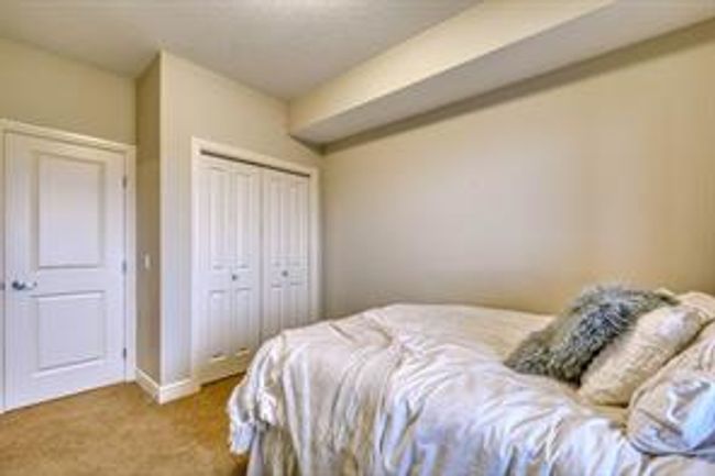 3406 - 15 Sunset Sq, Condo with 2 bedrooms, 2 bathrooms and 2 parking in Cochrane AB | Image 25